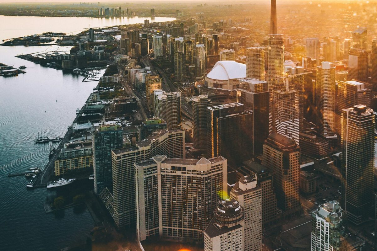 Canada Express Entry processing 2026 — Toronto skyline at sunset