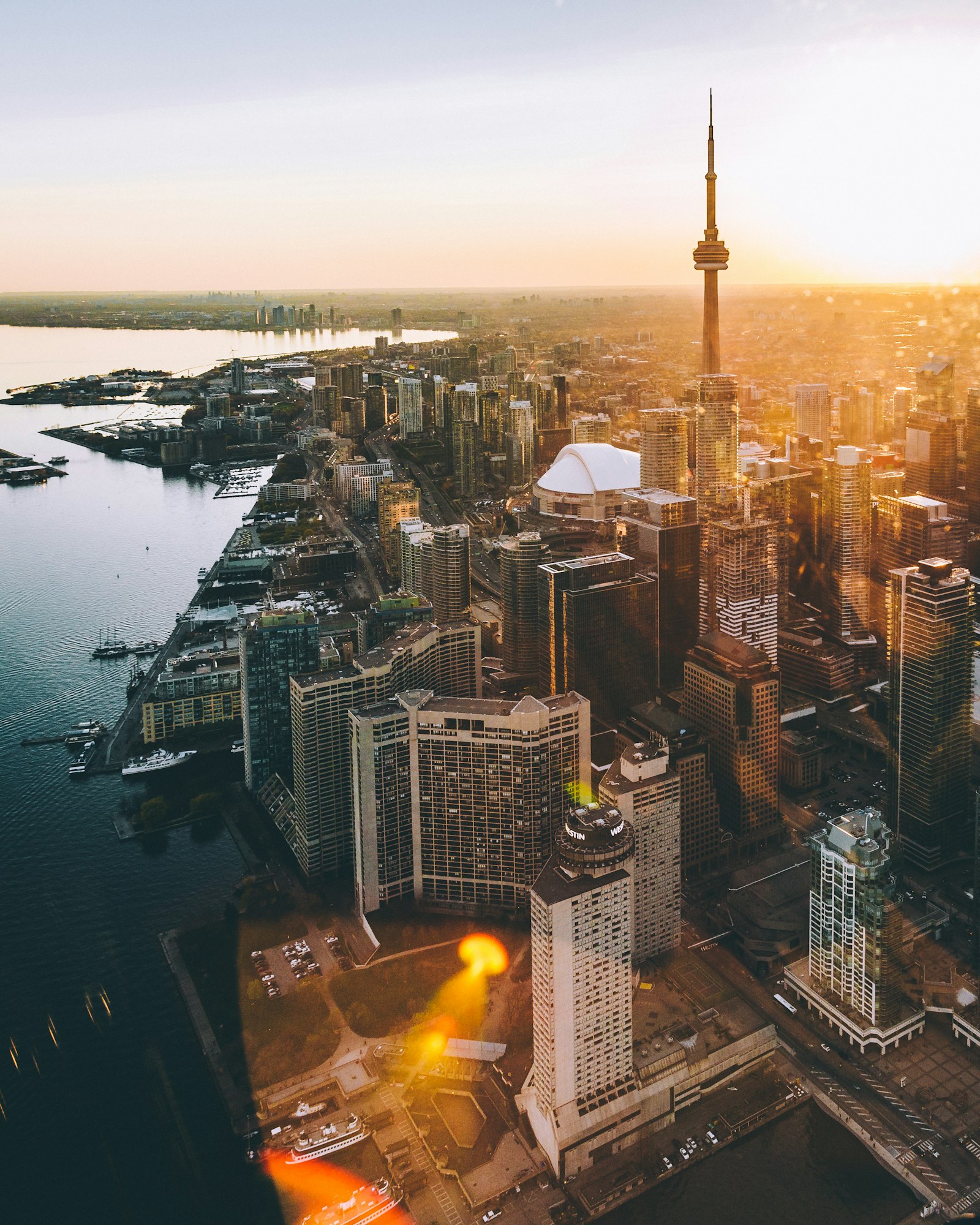 Canada Express Entry processing 2026 — Toronto skyline at sunset