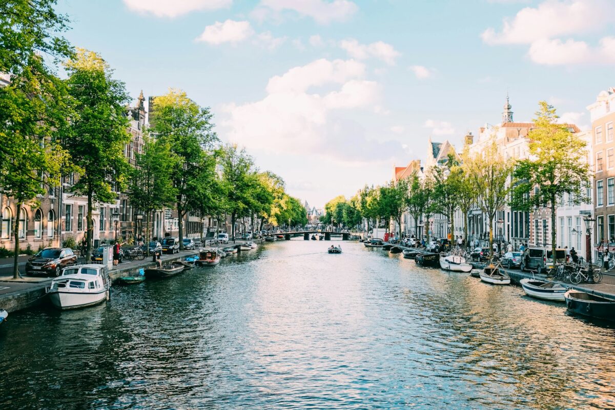Netherlands single permit processing in 2026, Amsterdam canal houses
