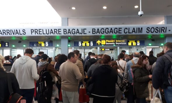 Passport control booth representing the new Australia visa character checks under Direction 123