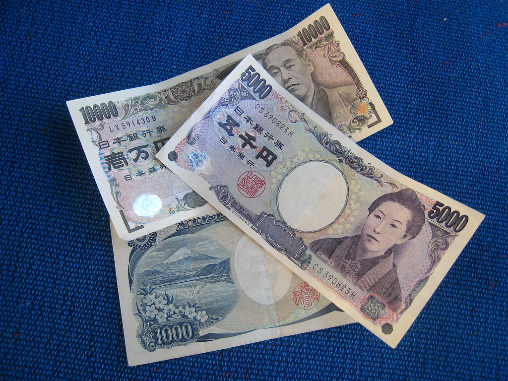 Fed rate decision October stacks of US dollar banknotes
