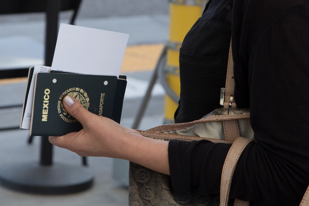 Henley Passport Index 2026 stack of international passports