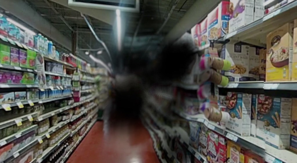 Grocery store aisle stocked with products amid the Instacart sale talks with DoorDash and Uber
