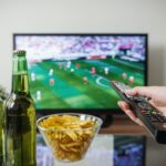 Television remote control representing Netflix Q3 2026 earnings and its streaming business