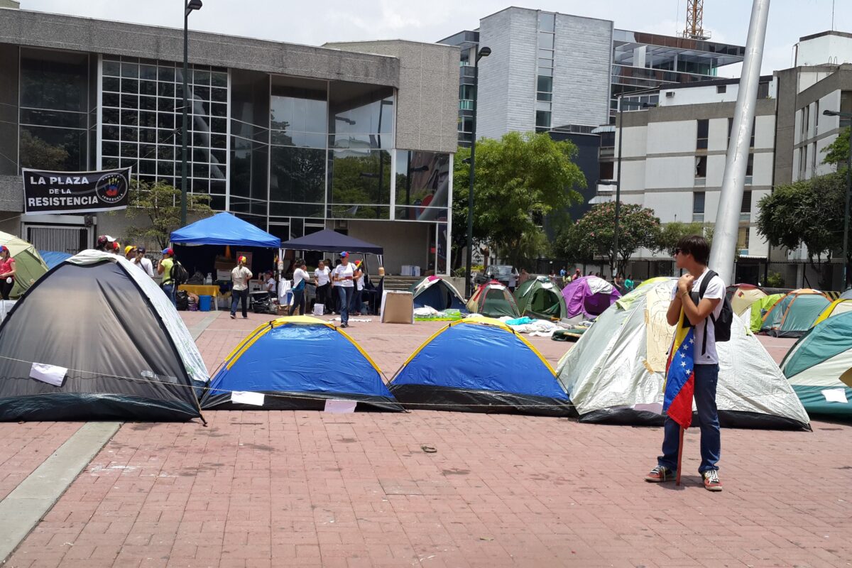 Demonstrators at the Venezuela election protests gathering in a city square